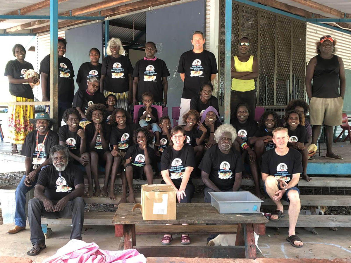 Community group sitting at Buluhkaduru